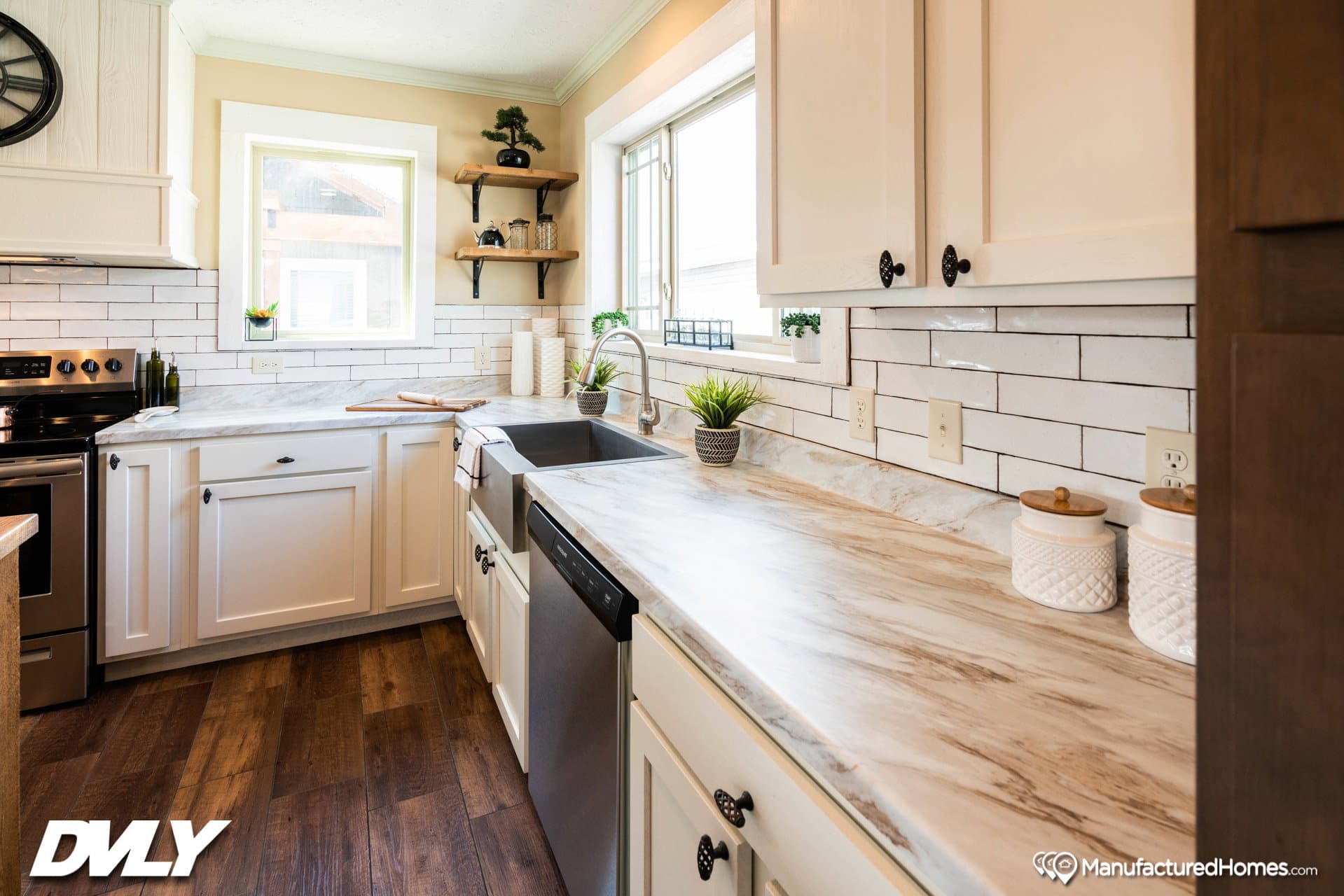 The adriel corner ½ rock fireplace kitchen home features