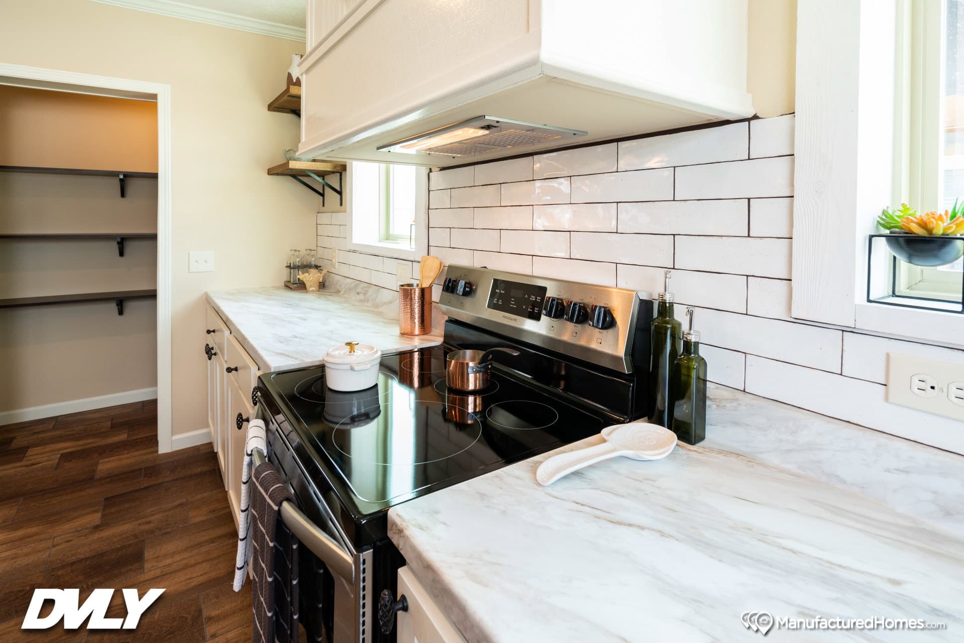 The adriel corner ½ rock fireplace kitchen home features