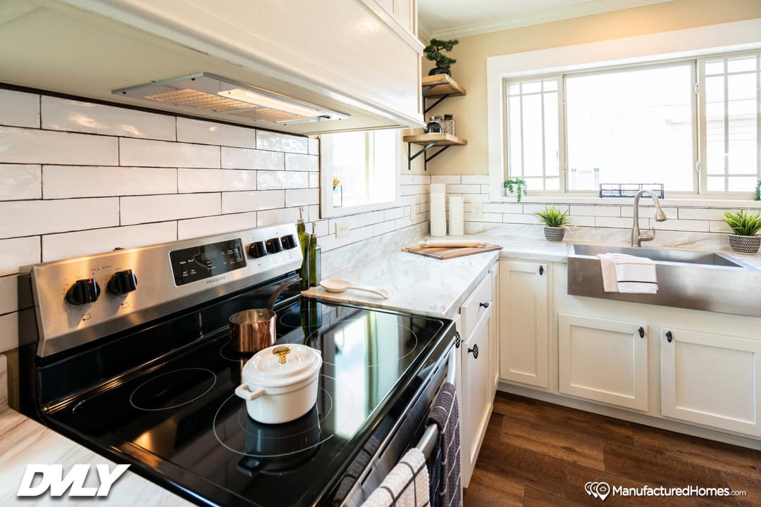 The adriel corner ½ rock fireplace kitchen home features