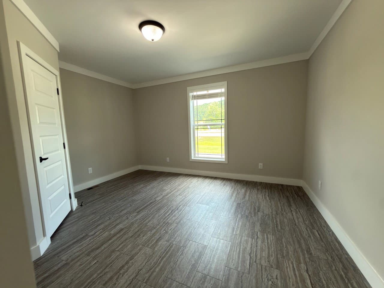 The barndominium bedroom home features