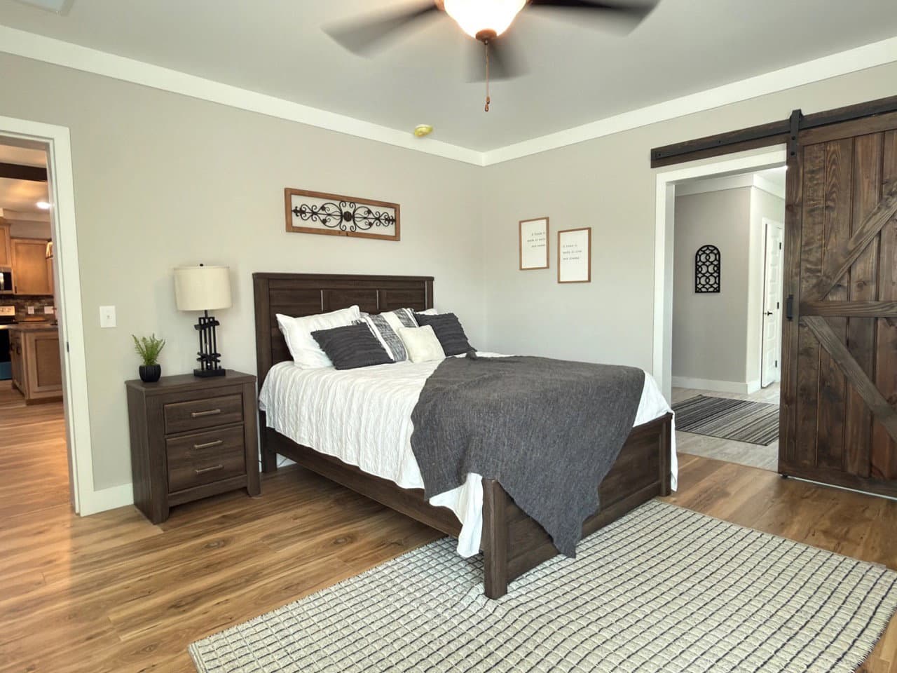 The barndominium bedroom home features